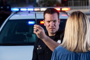 Police officer conducting sobriety test - Missouri DUI