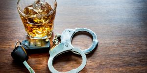 Alcohol Keys and Handcuffs - Missouri DUI